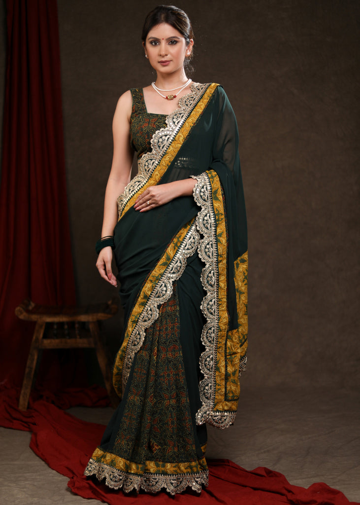 Stylish Emerald Green Georgette & Ajrakh Combination Saree Highlighted with Beautiful Lace