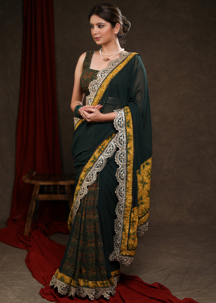 Stylish Emerald Green Georgette & Ajrakh Combination Saree Highlighted with Beautiful Lace