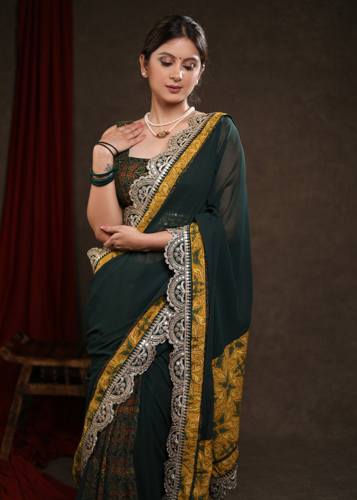 Stylish Emerald Green Georgette & Ajrakh Combination Saree Highlighted with Beautiful Lace