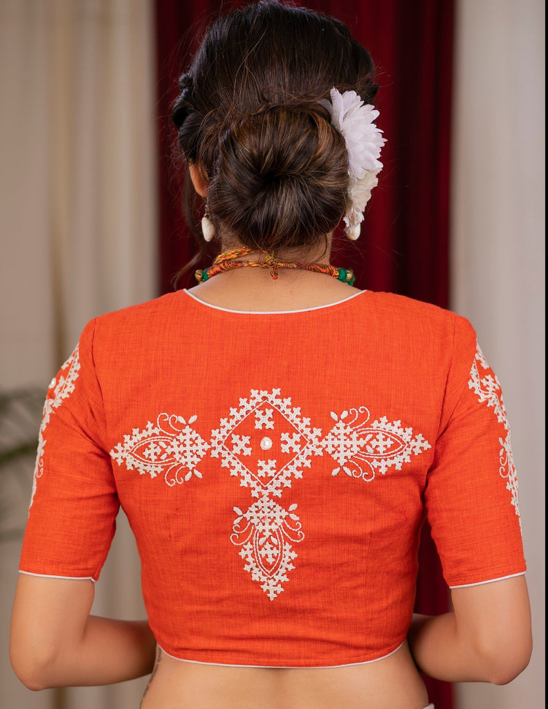 Exclusive orange cotton blouse with beautiful motif embroidery on back and sleeves