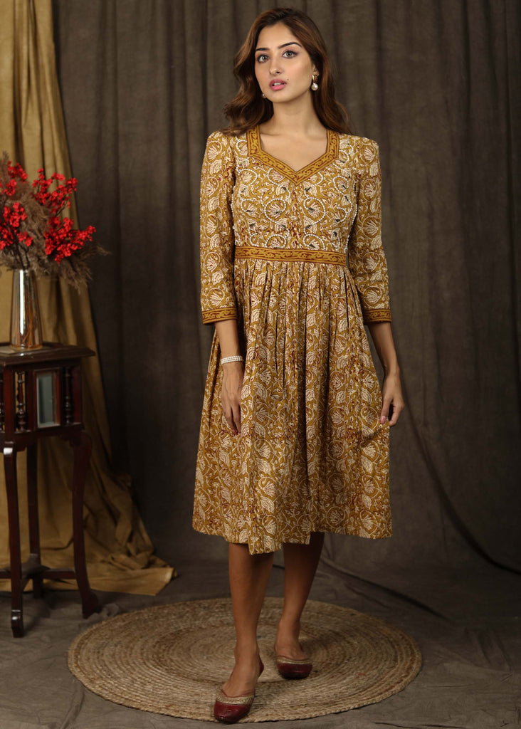 Casual mustard floral printed gathered dress with highlighted with beautiful pearl hand embroidery