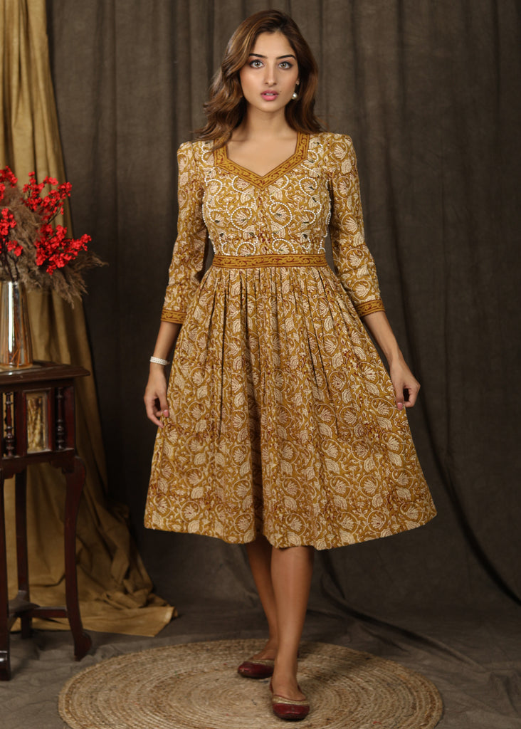 Casual mustard floral printed gathered dress with highlighted with beautiful pearl hand embroidery