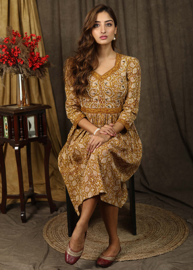 Casual mustard floral printed gathered dress with highlighted with beautiful pearl hand embroidery