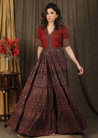 Elegant Ajrakh combination Kalidaar Gown with elbow sleeves highlighted with coin embellishments