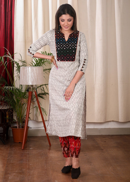 Graceful Straight Cut Ikat Kurta with Hand Embroidered Mirror Work On the Yoke and Beaded Sleeves