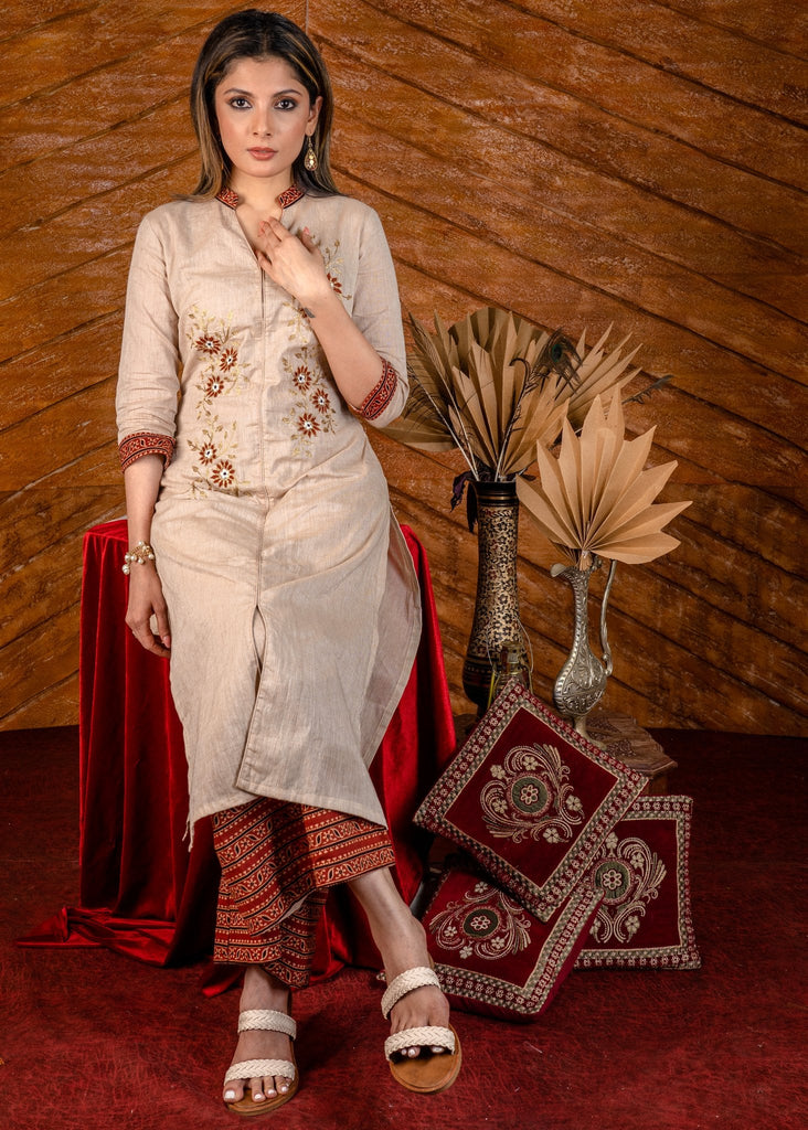 Exclusive embroidered cotton kurta with printed Ajrakh pallazo pant - Dupatta optional.